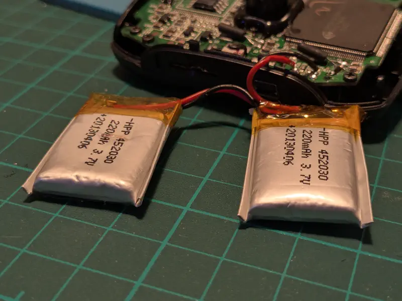 Two puffed up lipo cells.