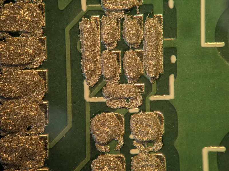 Sloppily applied solder paste.
