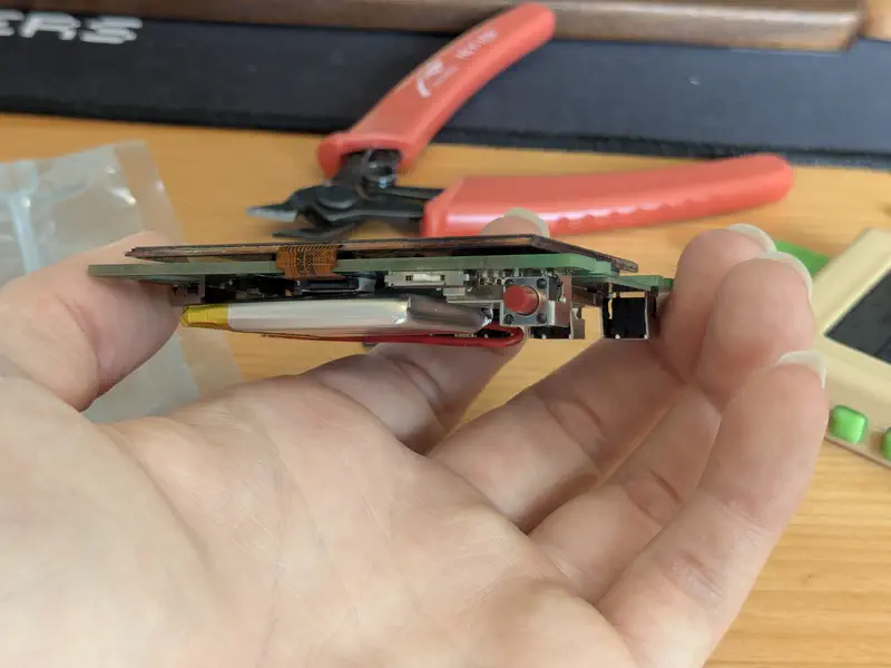 A sandwich of battery, PCB and screen.
