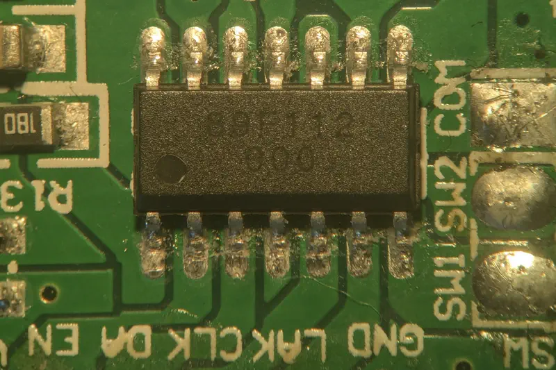 The MCU on the controller board, reading 89F112 000