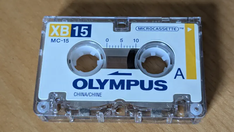 A plain microcasette tape.